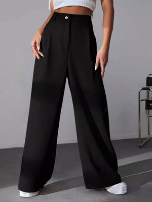 Black high-waisted pleated wide-leg maternity trousers with button detail.