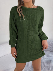 Dark green cable knit mini dress with crew neck and long sleeves.
