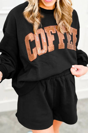 Black loungewear set with sequin coffee graphic sweatshirt and elastic waist shorts.