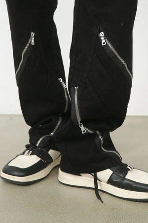 Zipped hem black denim trousers with silver hardware detail
