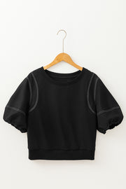 Black puff sleeve blouse with contrast stitching and crew neck.