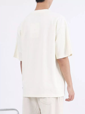 Men's oversized cotton t-shirt in Rice Apricot Color with crew neck.