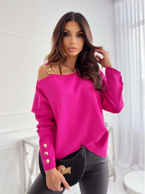 Hot Pink off-shoulder knit top with gold chain detail and button cuff.