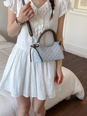 Polka Dot Mini Crossbody Bag in Blue, front view