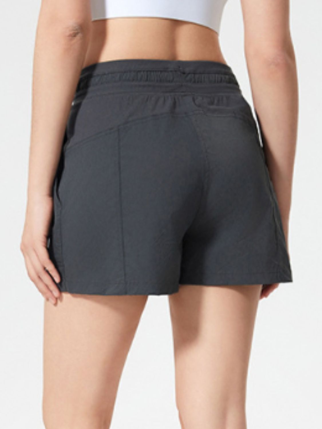 Coastal drawstring utility shorts in dark gray with side pockets and elastic waistband.