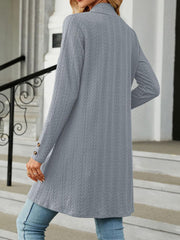 Gray textured knit longline cardigan with button cuffs and a collar.