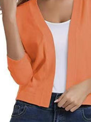 Cropped open-front knit cardigan in Sherbet with elbow sleeves.