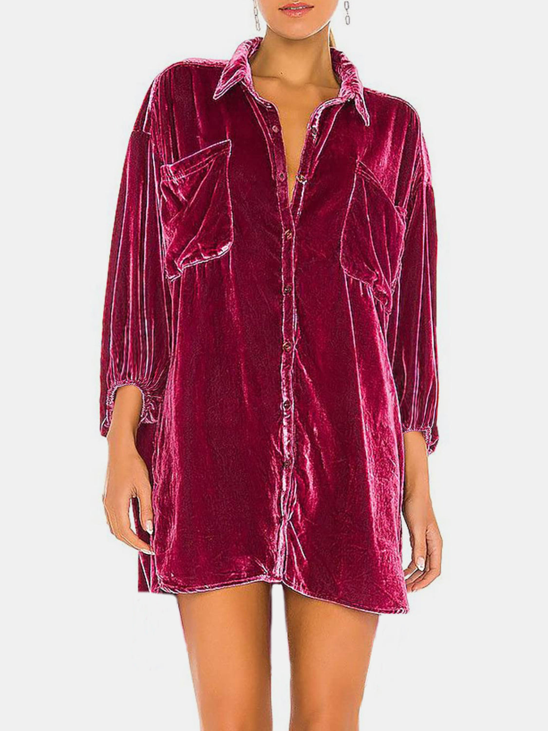 Velvet oversized shirt in deep purple with button front and chest pockets.