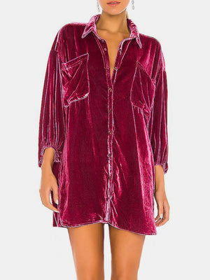 Velvet oversized shirt in deep purple with button front and chest pockets.