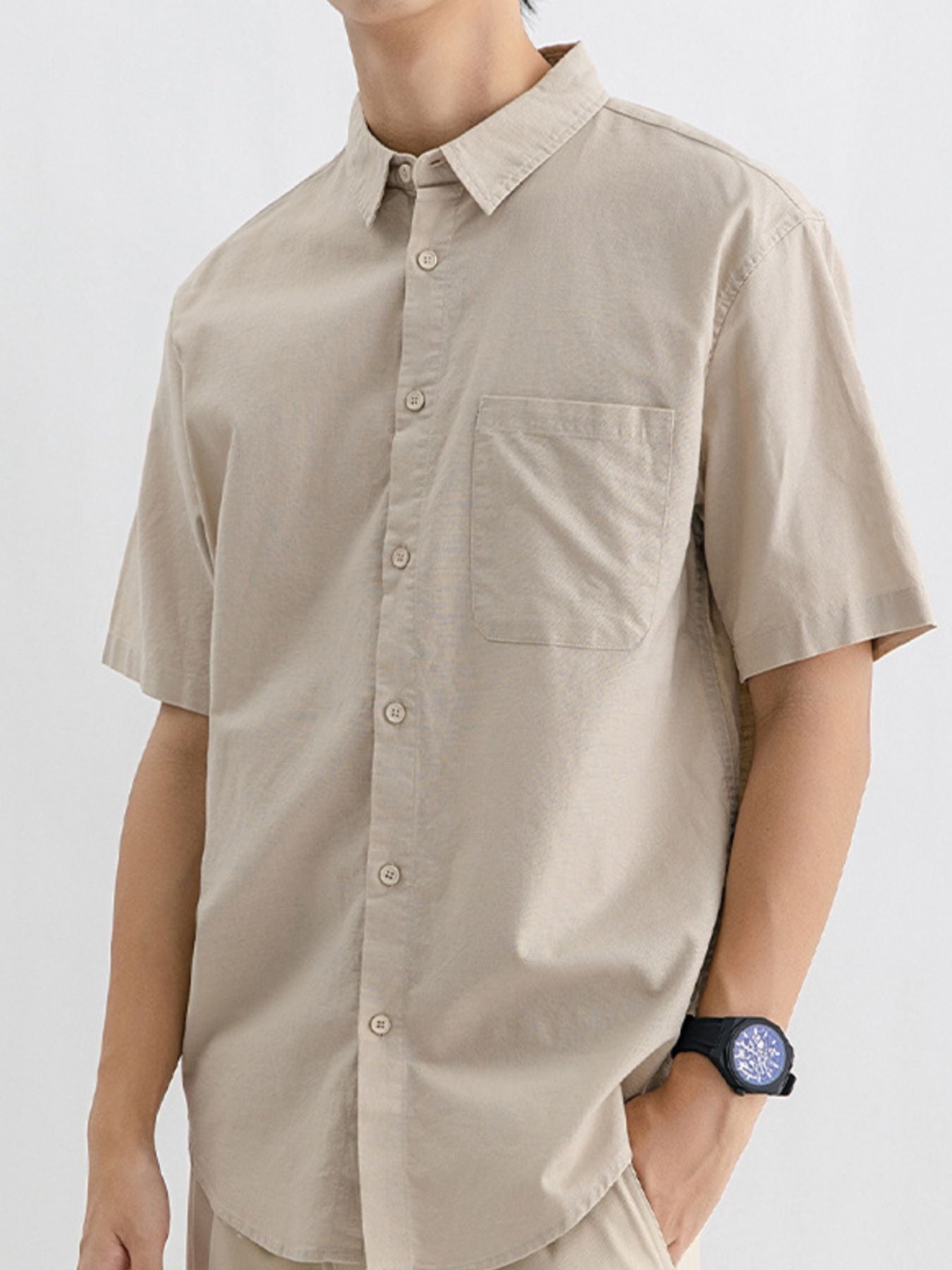 Men's Khakis short sleeve cotton button-up shirt with chest pocket.