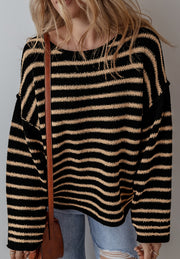 Black and tan horizontal stripe slouchy knit jumper with a crew neck.