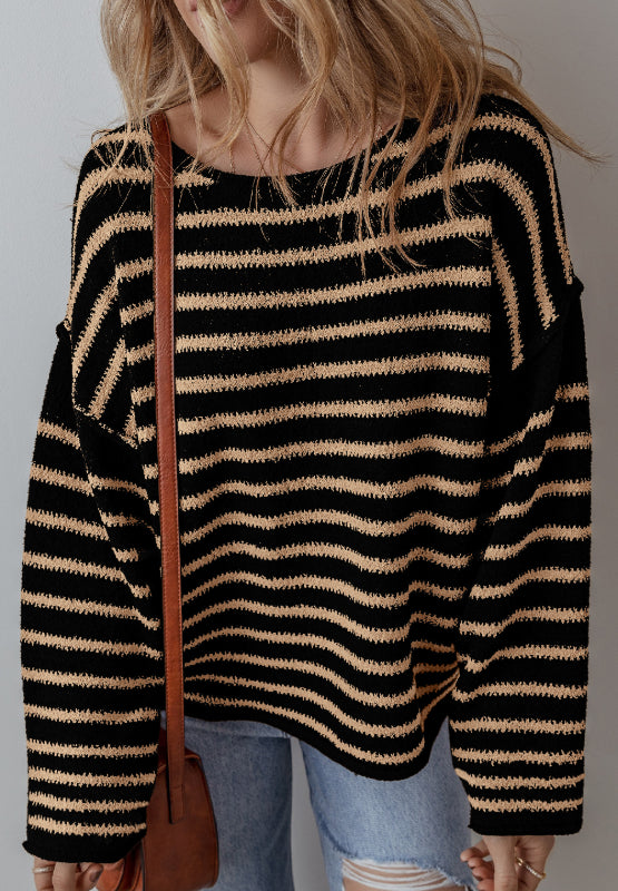 Black and tan horizontal stripe slouchy knit jumper with a crew neck.