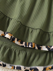 Baby set with olive green ribbed fabric, ruffle hem, and leopard print trim.