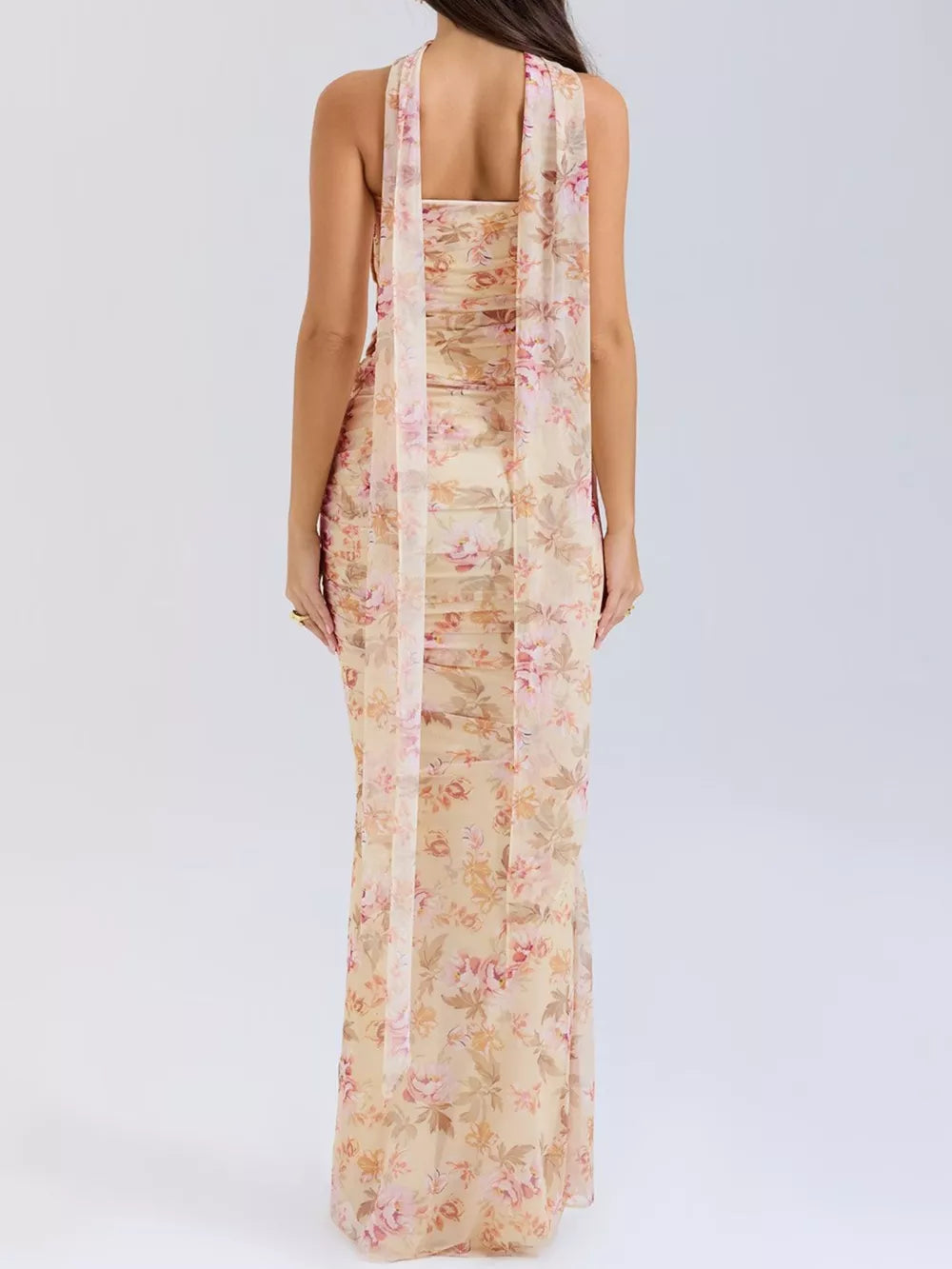 Flowy maxi skirt set with sweetheart tube top in a floral print, featuring a draped scarf detail.