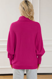 Deep Rose acrylic turtleneck sweater with dolman sleeves and ribbed cuffs and hem.