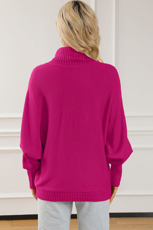 Deep Rose acrylic turtleneck sweater with dolman sleeves and ribbed cuffs and hem.