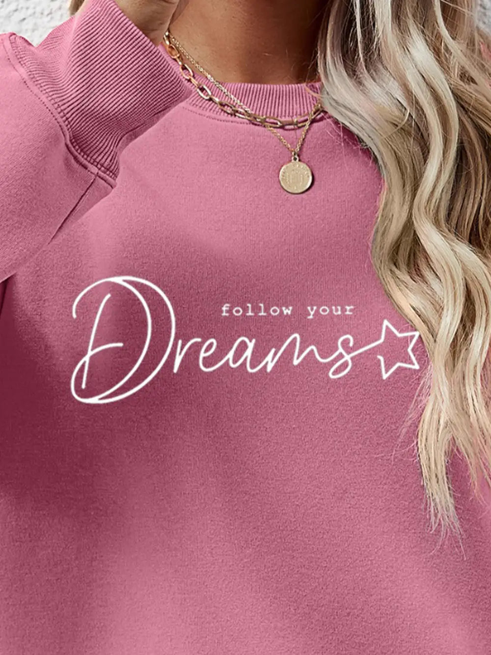 Dreams Scripted Oversized Sweatshirt in Blush Pink with crew neck and white graphic text.