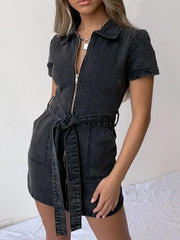 Zipper front denim mini dress in dark gray with collared neckline and belted waist.
