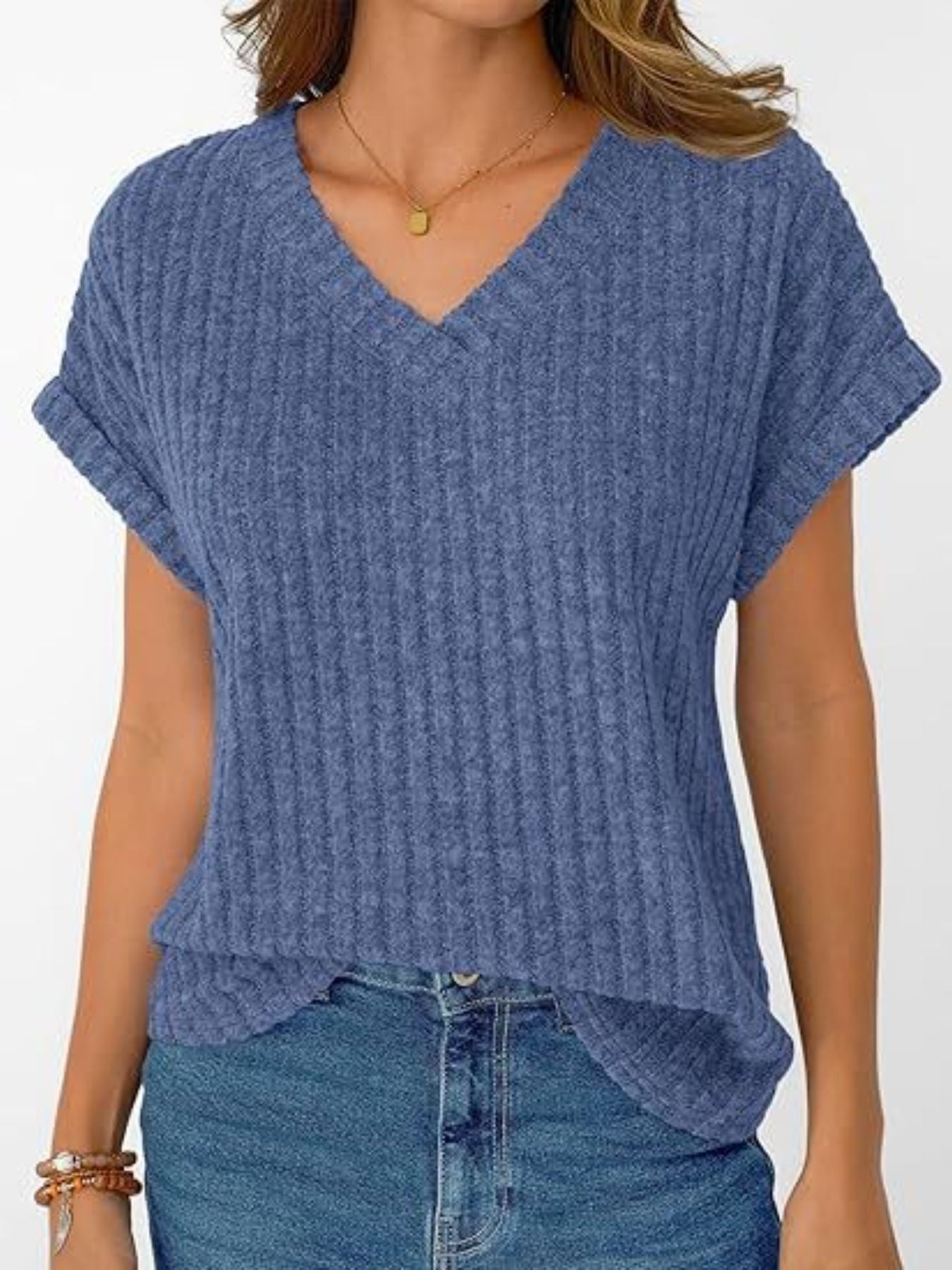 Blue ribbed v-neck t-shirt with cuffed short sleeves and a relaxed fit.