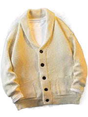 Beige ribbed knit cardigan with shawl collar, button front, and patch pockets.