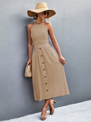 Khaki button-down midi dress with halter neck and ruffled waist detail.