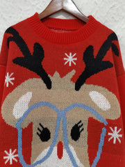 Red acrylic knit sweater with reindeer and snowflake graphic, crew neck.