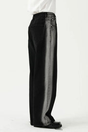Dark wide leg jeans with faded side panels and a relaxed fit.