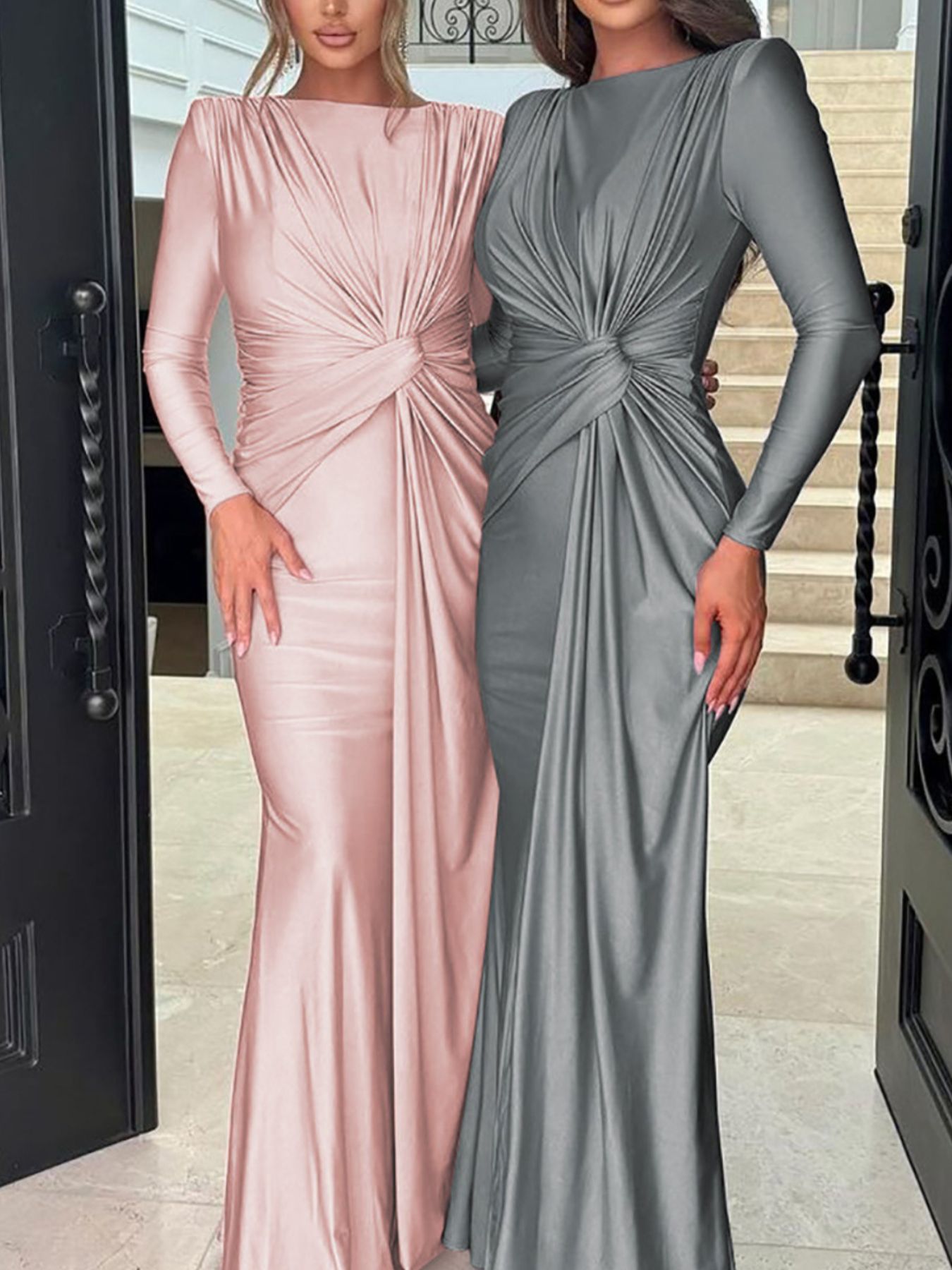 Ruched knot front maxi dress in pink and gray with long sleeves and a draped skirt.
