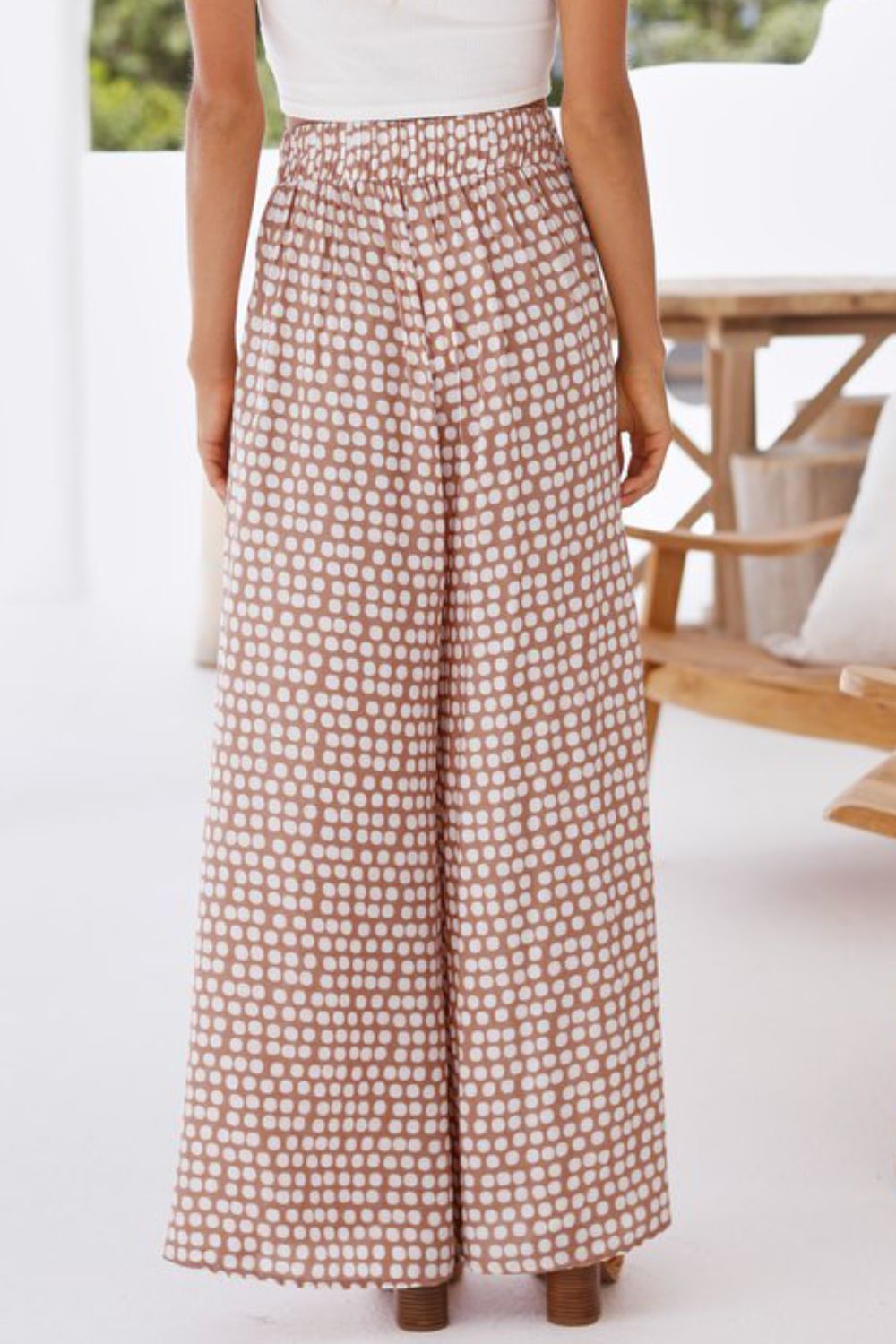 Polka dot wide leg culottes in dusty pink with a comfortable elastic waist.
