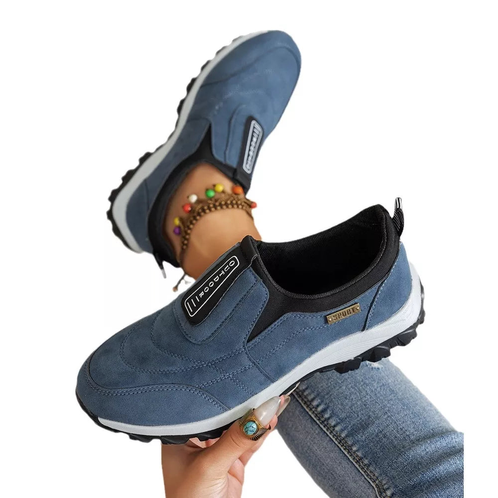 Blue suede-like round toe slip-on sneakers with "Outdoor" and "Sport" accents.