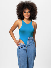 Cerulean tank bodysuit with high cut, worn with high-waisted jeans.