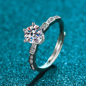 Sterling silver ring with 1 carat brilliant moissanite and accent stones, adjustable band