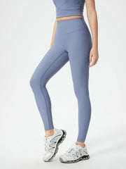 Light blue ribbed high-waist leggings with a sculpted fit and full length.