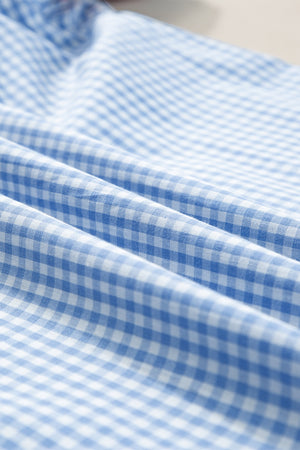 Light blue gingham embroidered sleeve blouse fabric detail