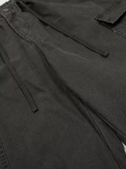Black cargo pants with drawstring waist and adjustable features.