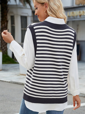 Striped knit vest with V-neck and side slits, worn over a white shirt.