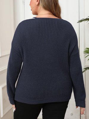 Dark Navy ribbed knit sweater with V-neck and contrast trim detail.