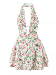 Floral halter neck mini dress with plunging neckline and pleated skirt.