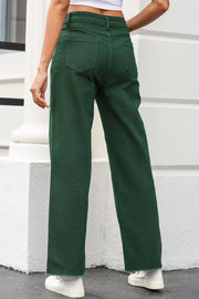 Green cotton straight-leg jeans with a crossed v-waist and frayed hem.