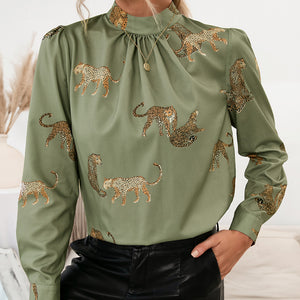 Matcha green leopard print blouse with keyhole neck and gathered detail.