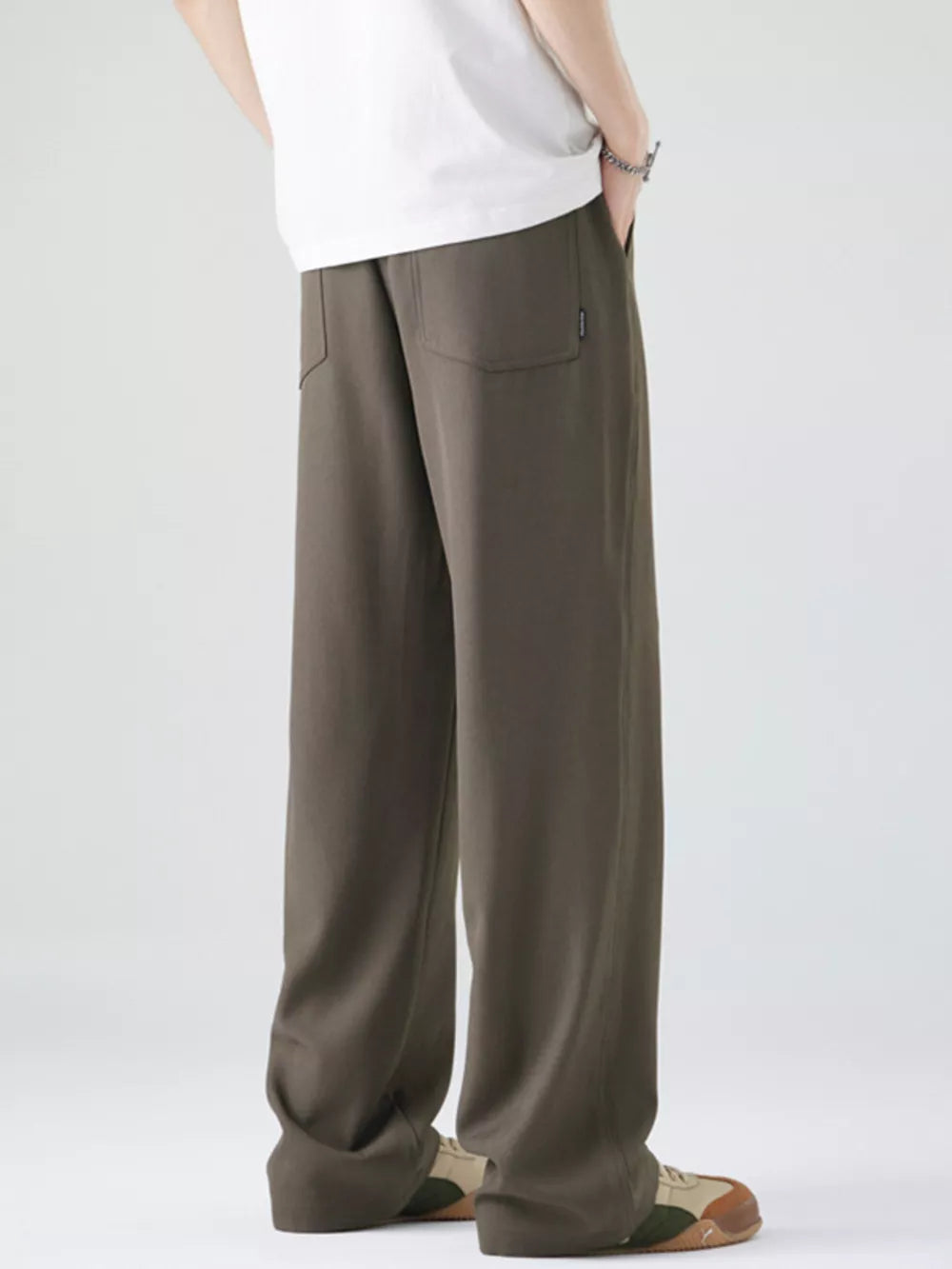 Dark brown casual drawstring sweatpants with back pockets and a relaxed fit.