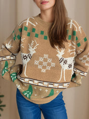 Tan acrylic knit sweater with reindeer and snowflake motif, crew neck, long sleeves.