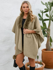 Camel faux fur collar wrap poncho with tie belt and pom-pom detail.