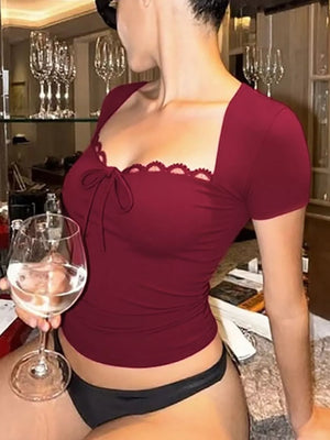 Wine red tie-front t-shirt with lace trim and square neckline.