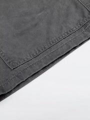 Men's grey cotton cargo capris with visible stitching detail on pocket.