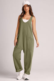Relaxed fit tank jumpsuit in matcha green with V-neck and large front pockets.
