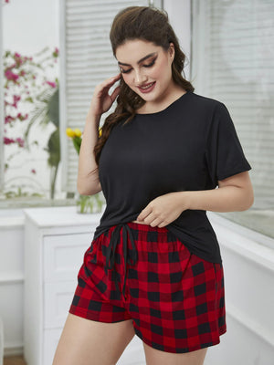 Relaxed black tee with red and black plaid drawstring shorts set