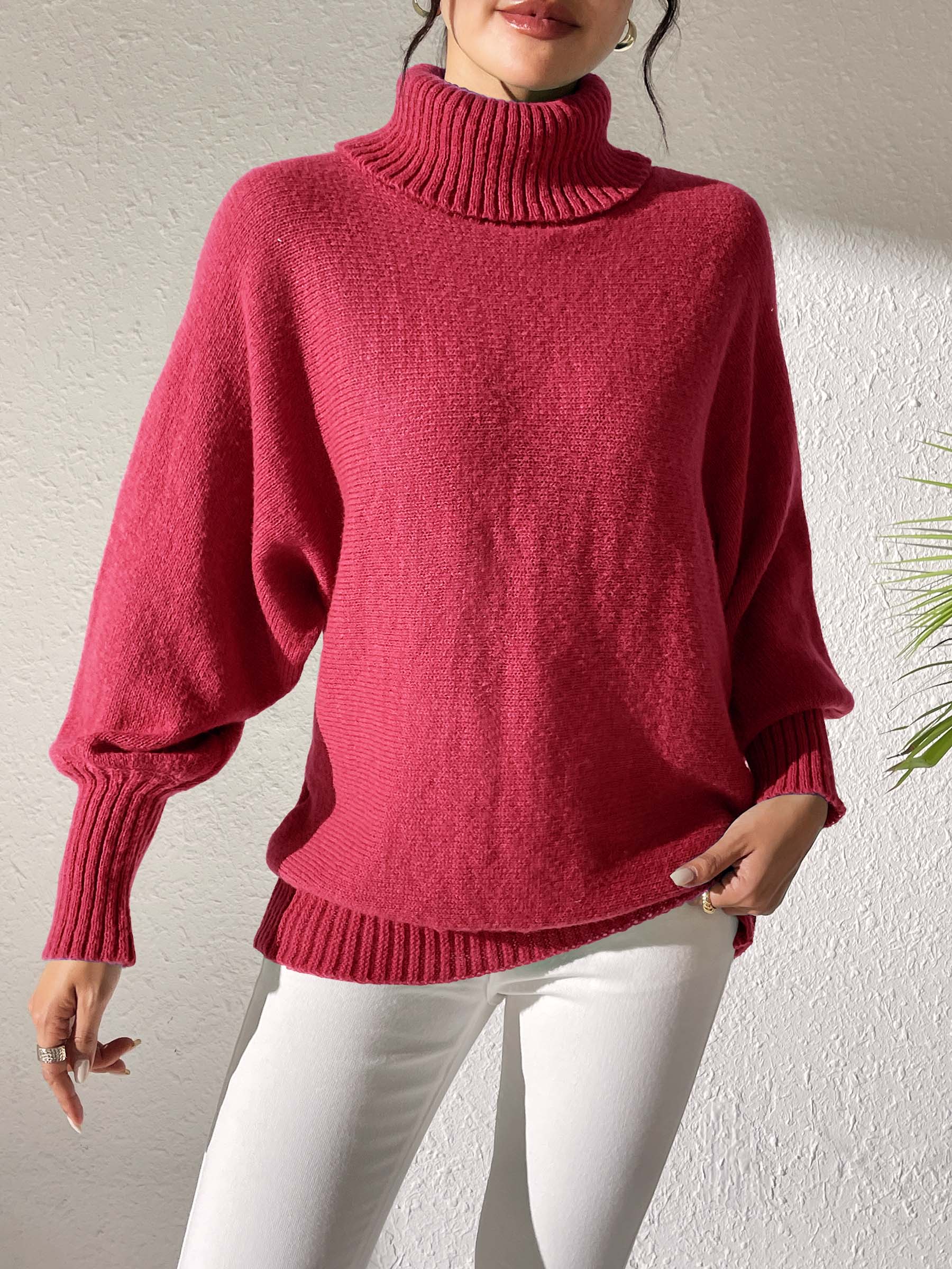 Deep Red balloon sleeve turtleneck sweater with ribbed cuffs and hem.