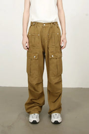 Khaki cargo trousers with multiple pockets and a wide-leg fit.