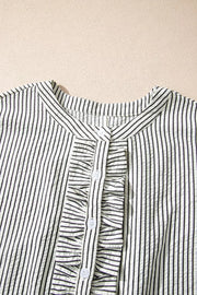 Black and white striped maternity swim dress with ruffle placket and buttons.